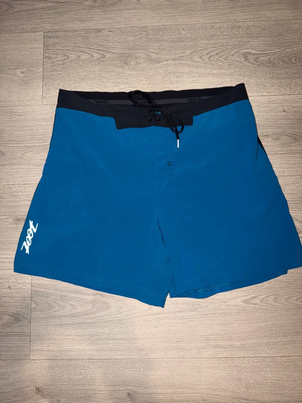 Zoot Teal-Blue Swim Shorts with Black Waistband